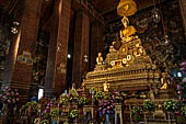 Bangkok Wat Pho, altar of the ubosot with statues of Buddha and disciples.  